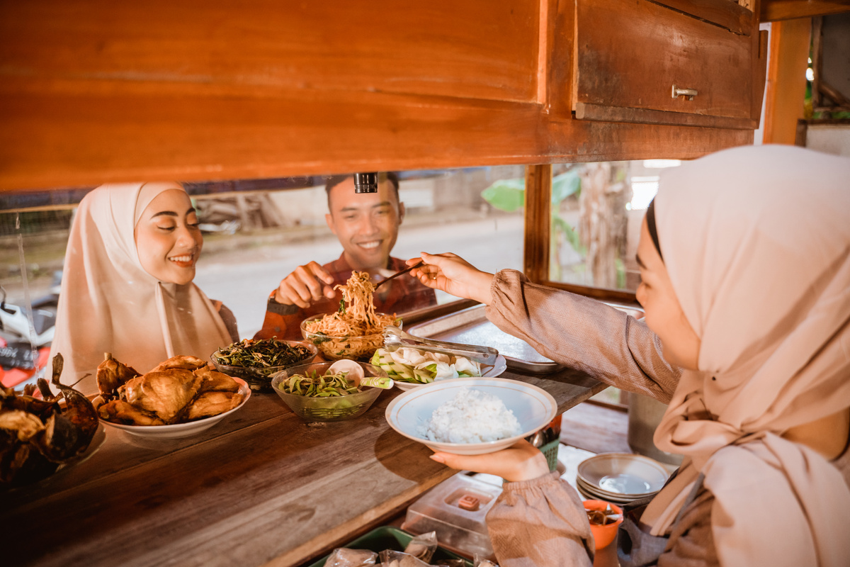 Muslim Customer Buying and Choosing Food at Traditional Food Stall