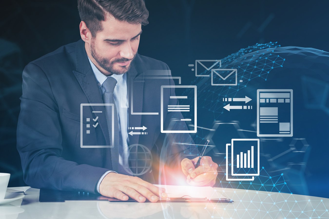 Businessman writing in office, electronic document